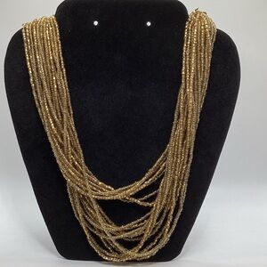 Gold Multi‑Strand Beaded Necklace